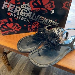 Gently used, strap sandals.